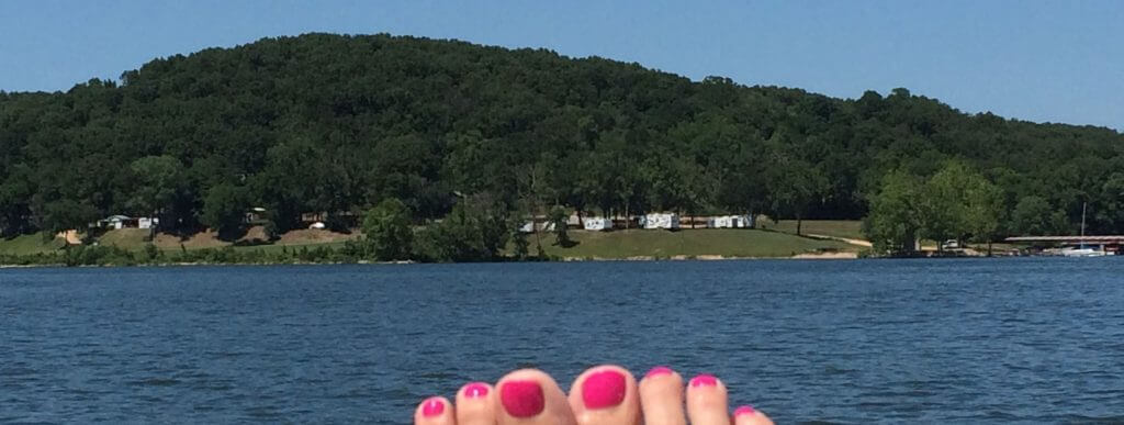 Pink toenails over Lake Tenkiller at Elk Creek Resort